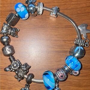 Pandora Silver Bracelet with Blue and Silver Sterling cones with 16 charmsCharms
